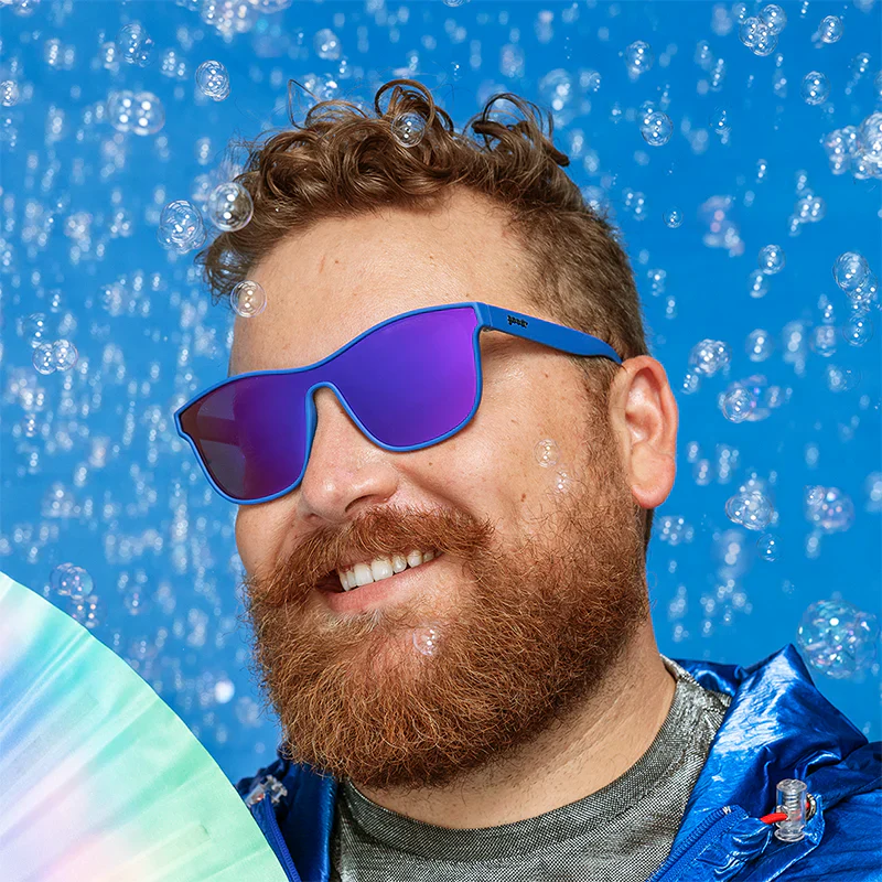 goodr VRG Best Dystopia Ever sunglasses, blue frame with mirrored violet lenses — styled product view