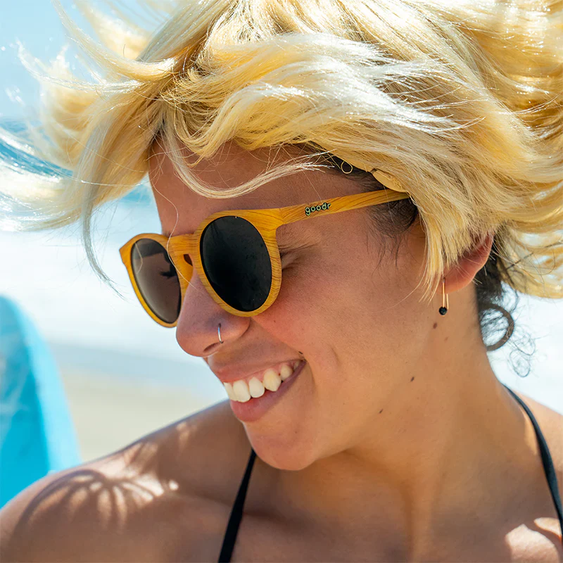 goodr Circle G Bodhi's Ultimate Ride sunglasses, mustard frame with brown lenses — styled product view