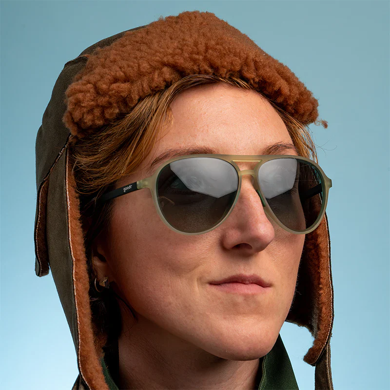goodr Mach G Buzzed On The Tower sunglasses, olive frame with olive gradient lenses — styled product view