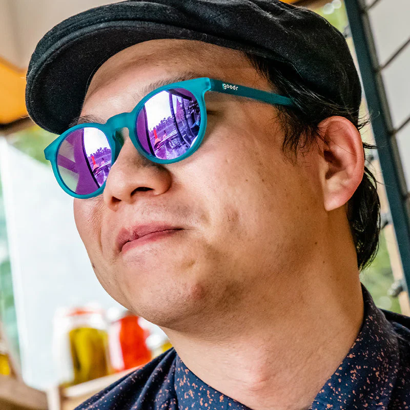 goodr Circle G I Pickled These Myself sunglasses, teal frame with mirrored light blue lenses — styled product view