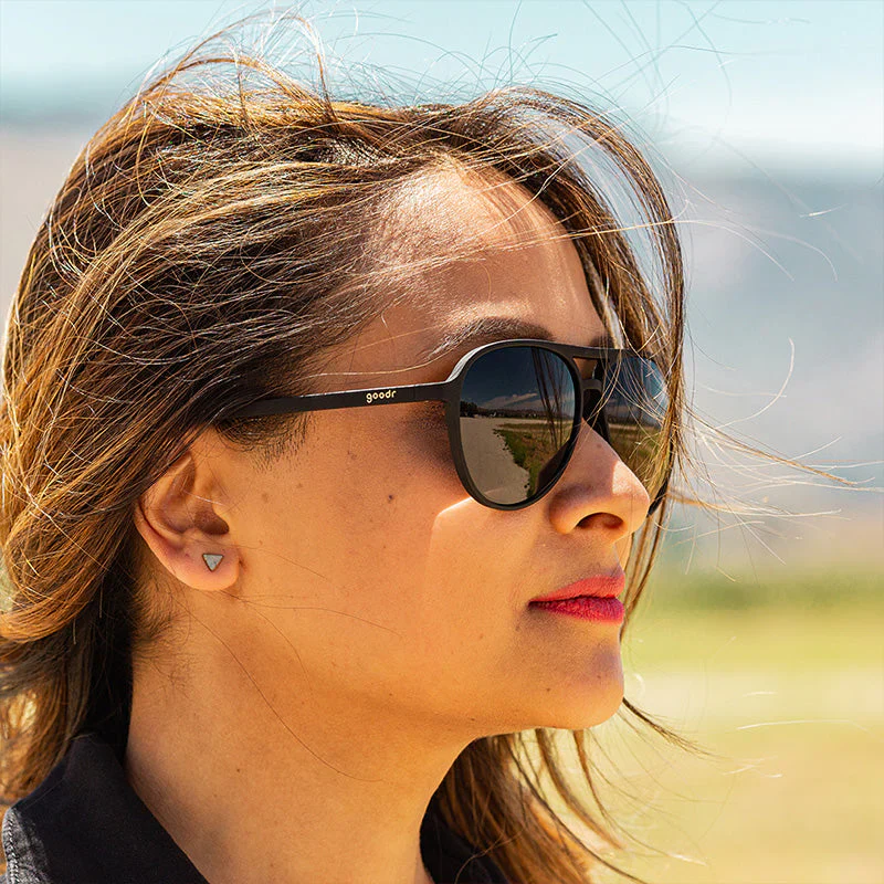 goodr Mach G Operation: Blackout sunglasses, charcoal frame with smoke lenses — styled product view