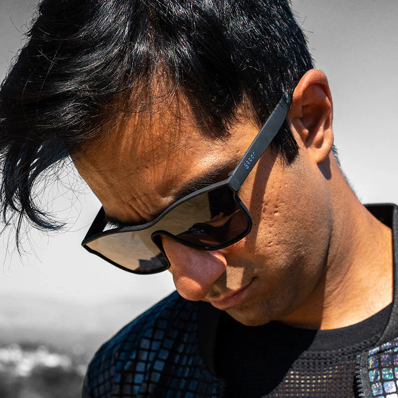 goodr VRG The Future is Void sunglasses, black frame with dark green lenses — styled product view