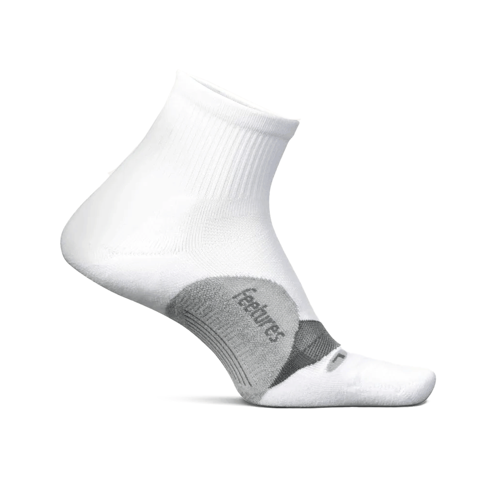 Feetures Elite Light Cushion Quarter sock in White — front view #Colour_White