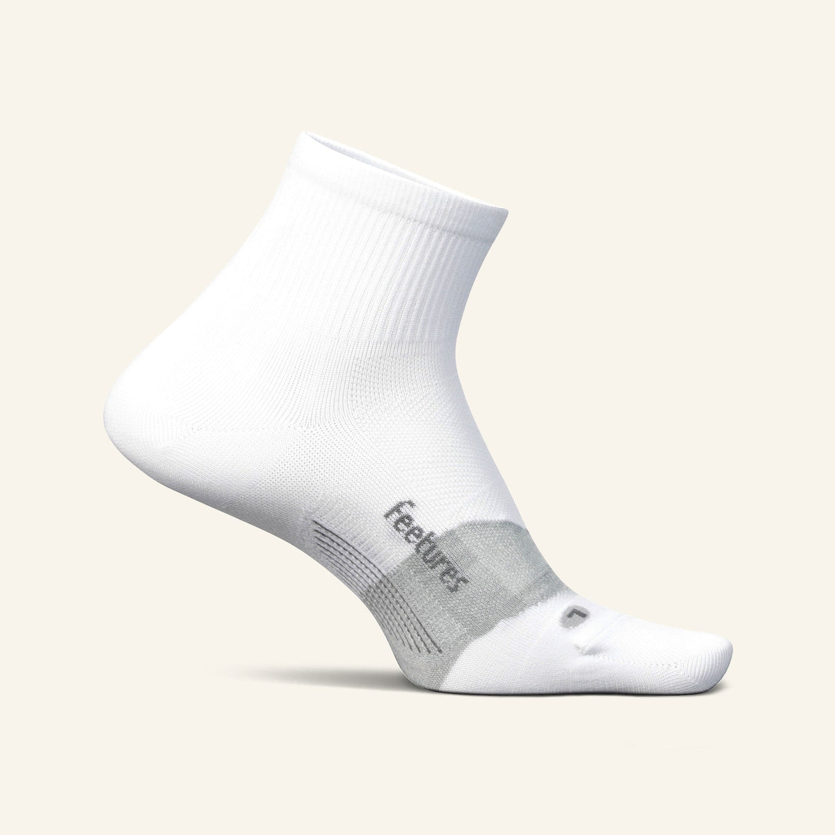 Feetures Elite Ultra Light Cushion Quarter sock in White — front view #Colour_White