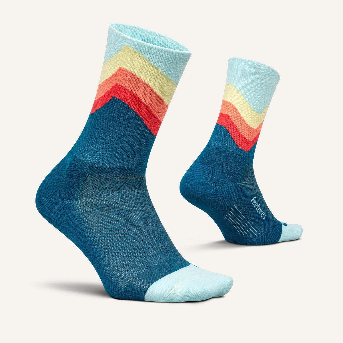 Feetures Elite Light Cushion Mini Crew sock in Blue Swell — pair view #Color_Blue Swell