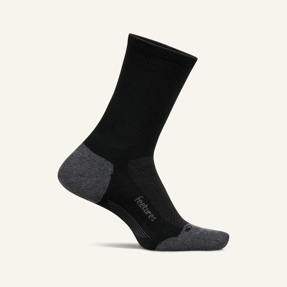 Feetures Elite Max Cushion Mini Crew sock in Black — front view #Color_Black