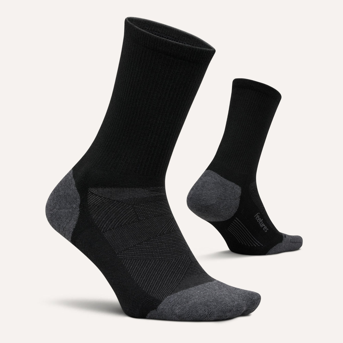 Feetures Elite Max Cushion Mini Crew sock in Black — pair view #Color_Black