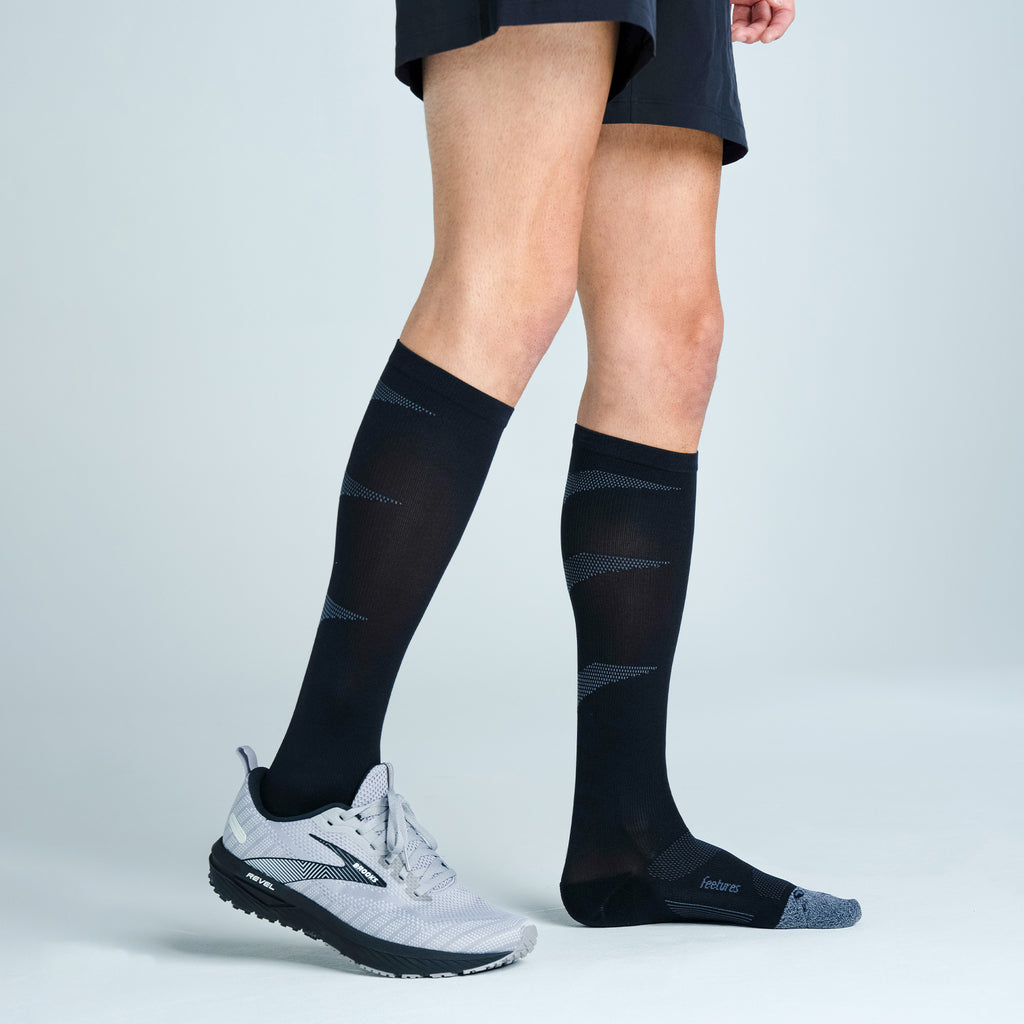 Feetures Graduated Compression Light Cushion Knee High sock in Black — lifestyle #Color_Black