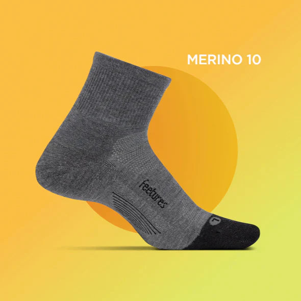 Feetures Merino 10 Ultra Light Cushion Quarter sock in Black — heel detail #Color_Black