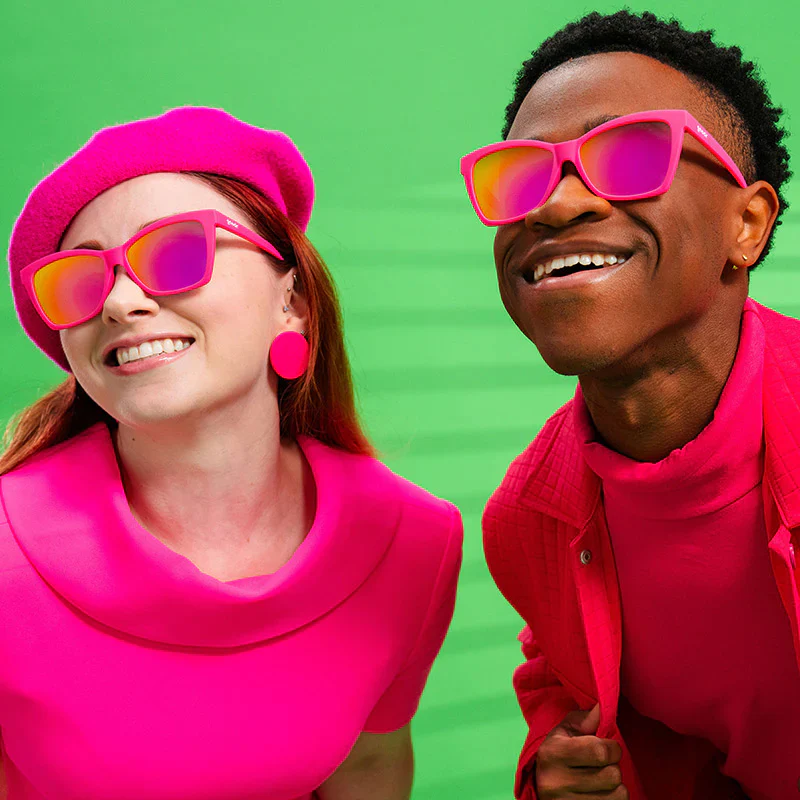 goodr Pop G Approaching Cult Status sunglasses, fuchsia frame with mirrored magenta lenses — styled product view
