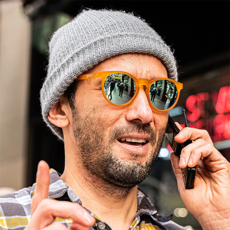 goodr Circle G Freshly Baked Man Buns sunglasses, mustard frame with mirrored lemon-lime lenses — styled product view