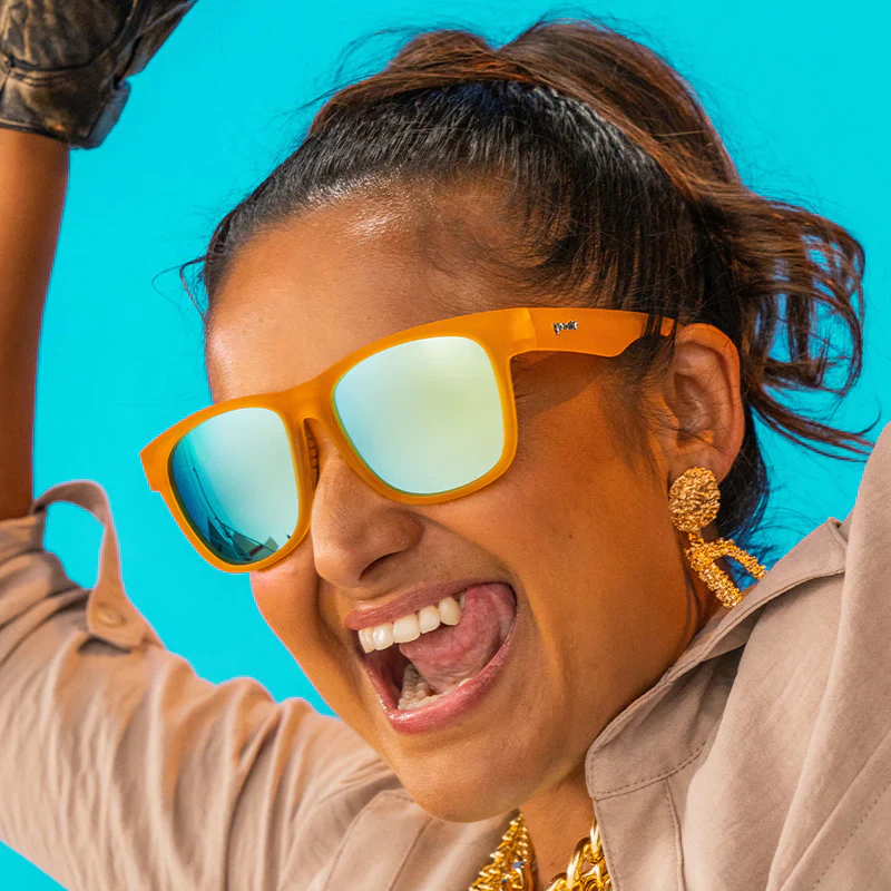goodr BFG Gold Digging with Sasquatch sunglasses, yellow frame with mirrored silver lenses — styled product view