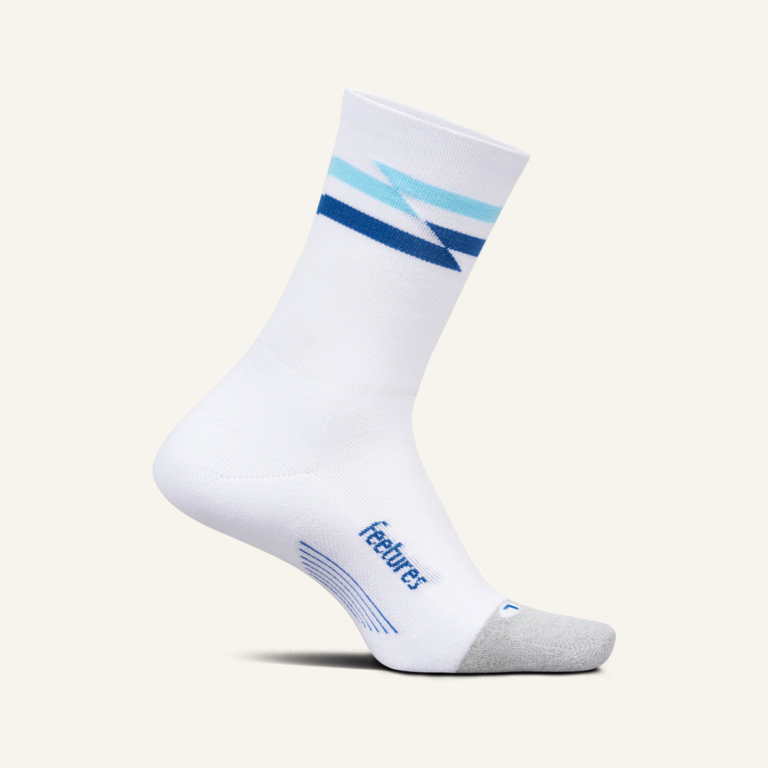 Feetures Elite Light Cushion Mini Crew sock in White Track — front view #Color_White Track