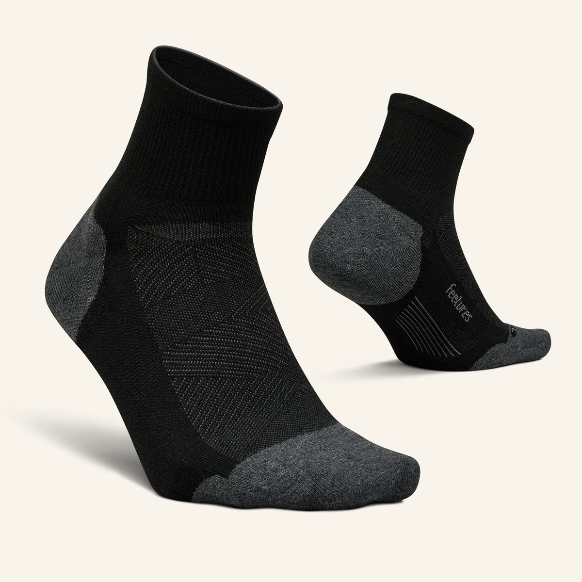 Feetures Elite Max Cushion Quarter sock in Black — pair view #Colour_Black