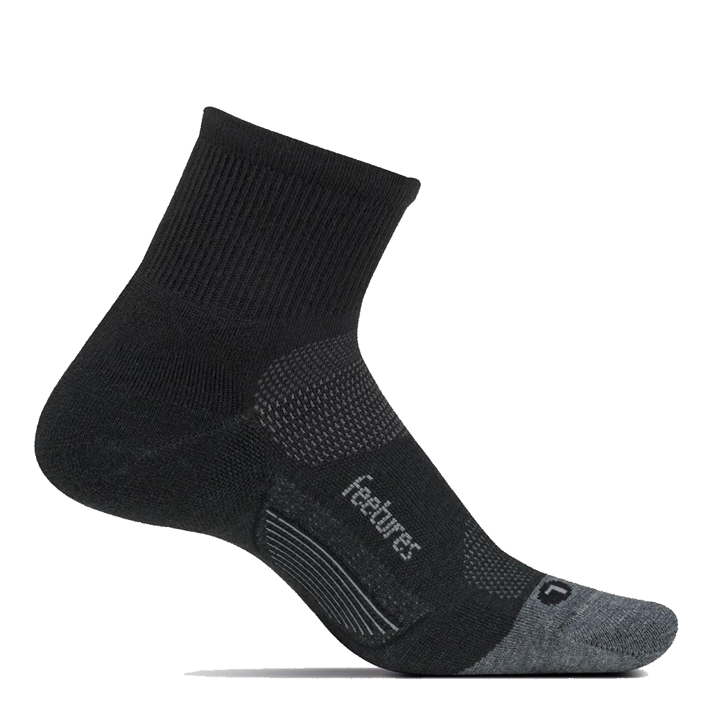 Feetures Merino 10 Max Cushion Quarter sock in Black — front view #Colour_Black