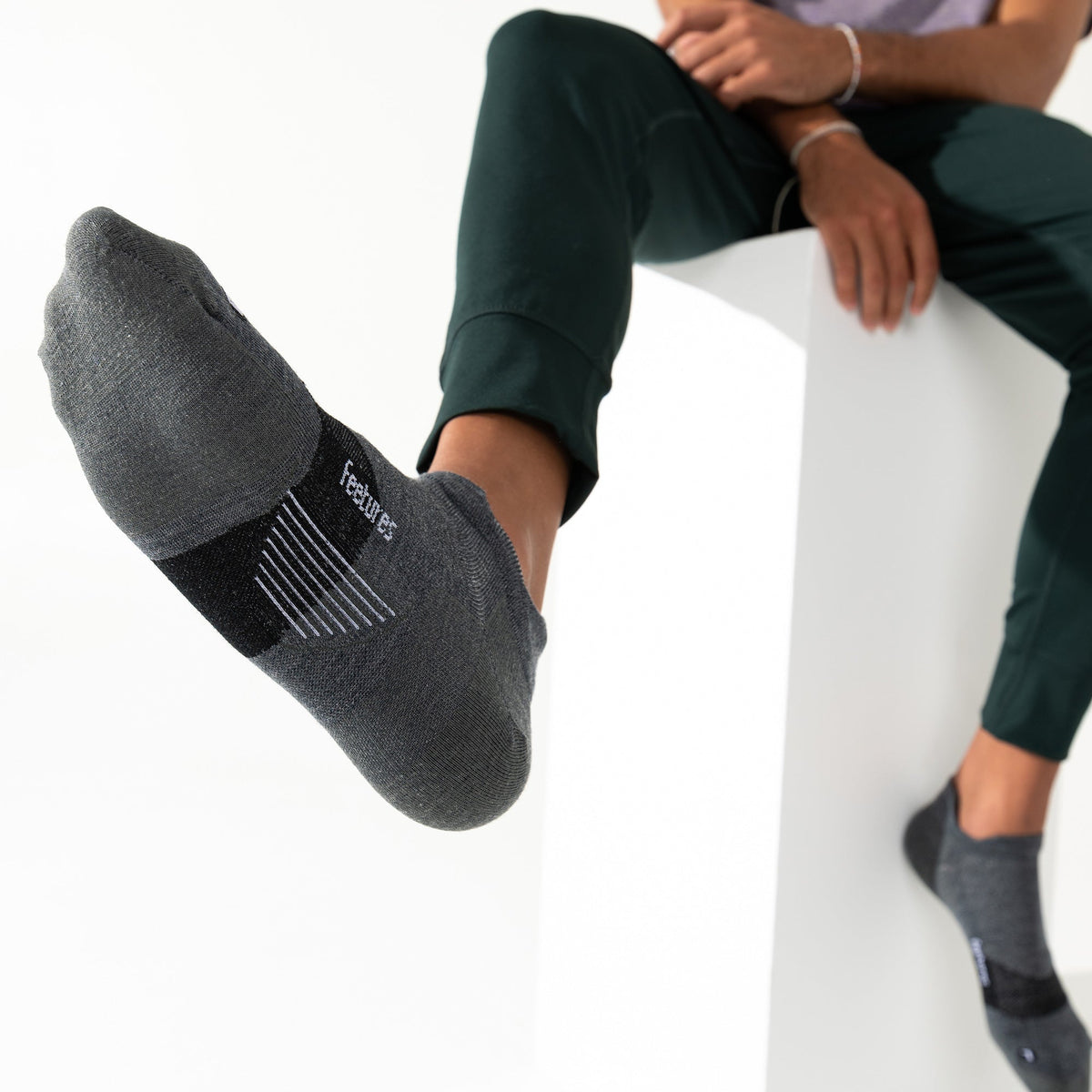 Feetures Merino 10 Ultra Light Tab sock in Grey — pair view #Color_Grey