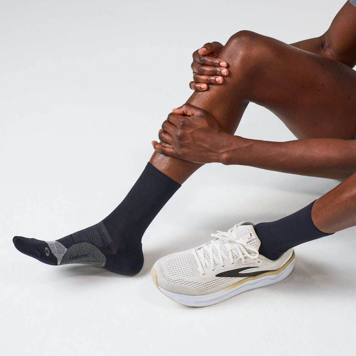 Feetures Elite Light Cushion Mini Crew sock in Black — lifestyle #Color_Black