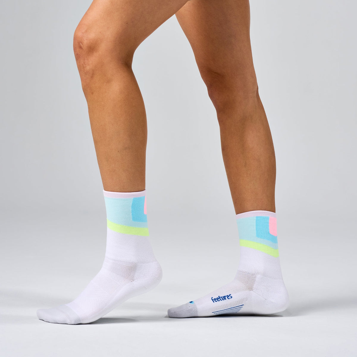 Feetures Elite Light Cushion Mini Crew sock in Candy Court — heel detail #Color_Candy Court