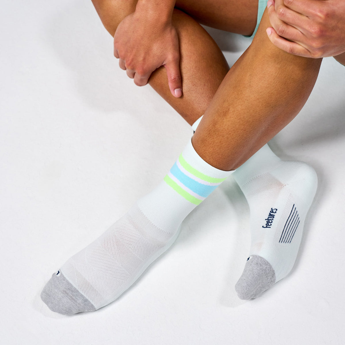 Feetures Elite Light Cushion Mini Crew sock in Mint Bounce — heel detail #Color_Mint Bounce