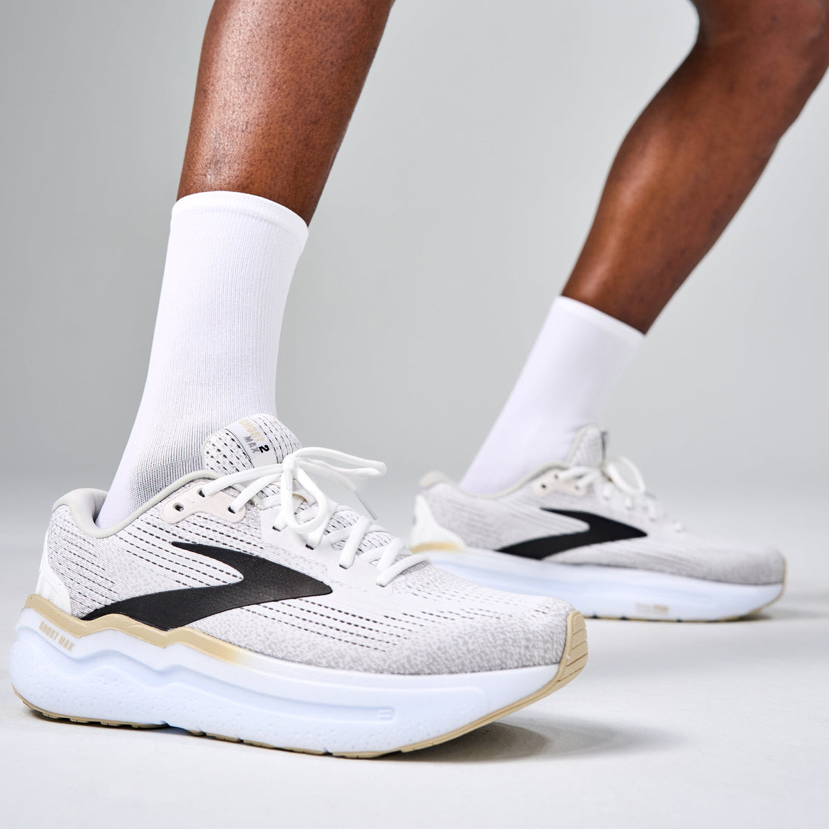 Feetures Elite Light Cushion Mini Crew sock in White — lifestyle #Color_White