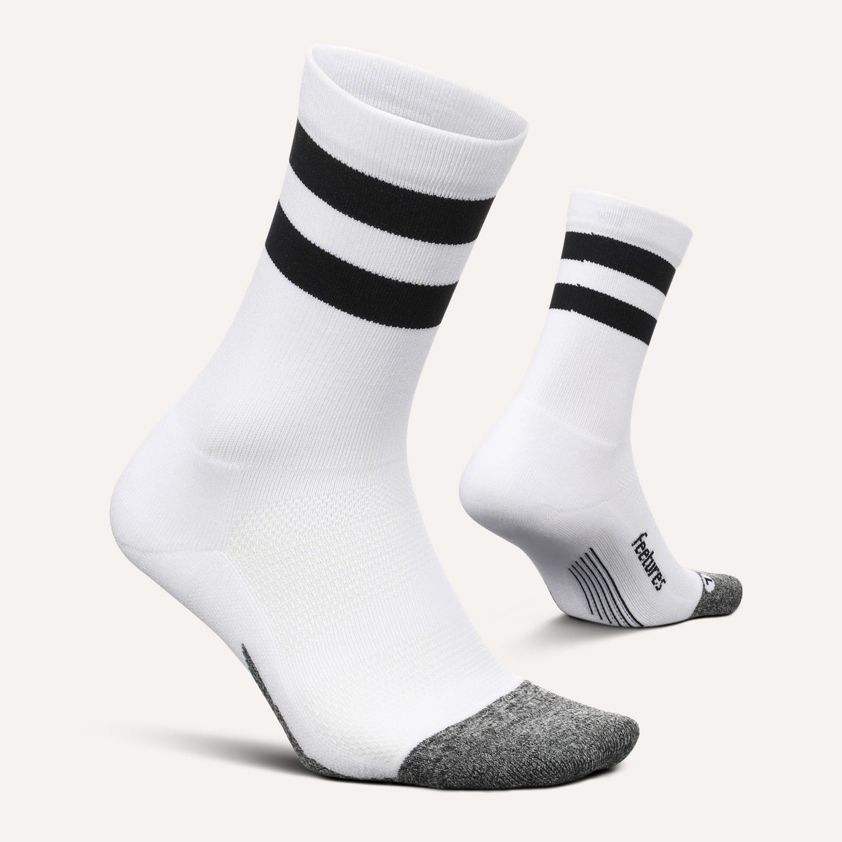 Feetures Elite Light Cushion Mini Crew sock in White High Top Stripe — pair view #Color_White High Top Stripe