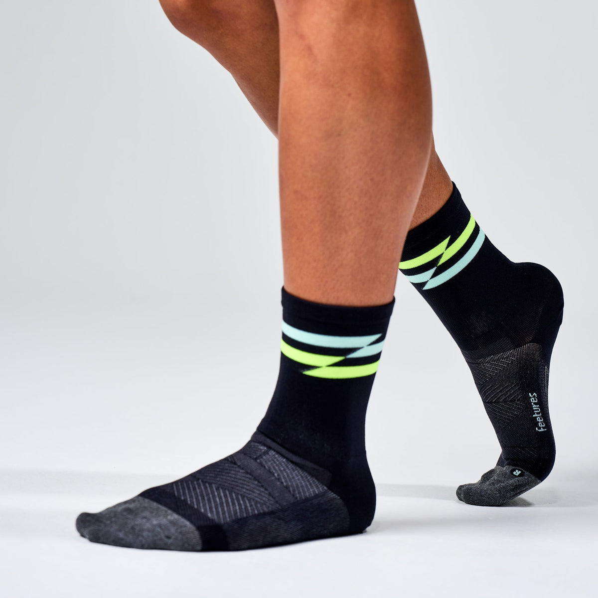 Feetures Elite Ultra Light Cushion Mini Crew sock in Night Track — heel detail #Colour_Night Track