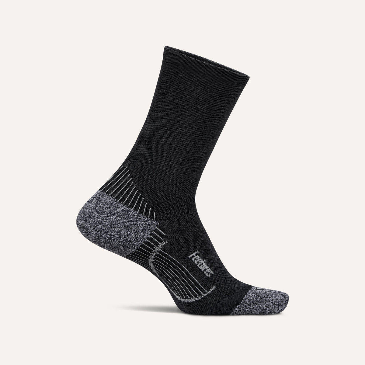 Feetures PF Relief Light Cushion Mini Crew sock in Black — front view #Color_Black