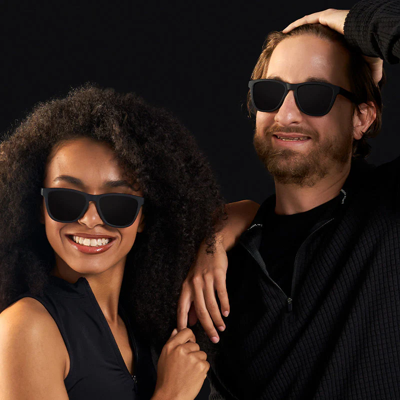 goodr OG A Unicorn's Calamity sunglasses, black frame with black lenses — styled product view
