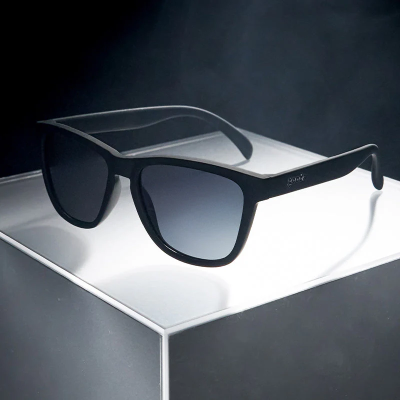 goodr OG A Unicorn's Calamity sunglasses, black frame with black lenses — styled product view