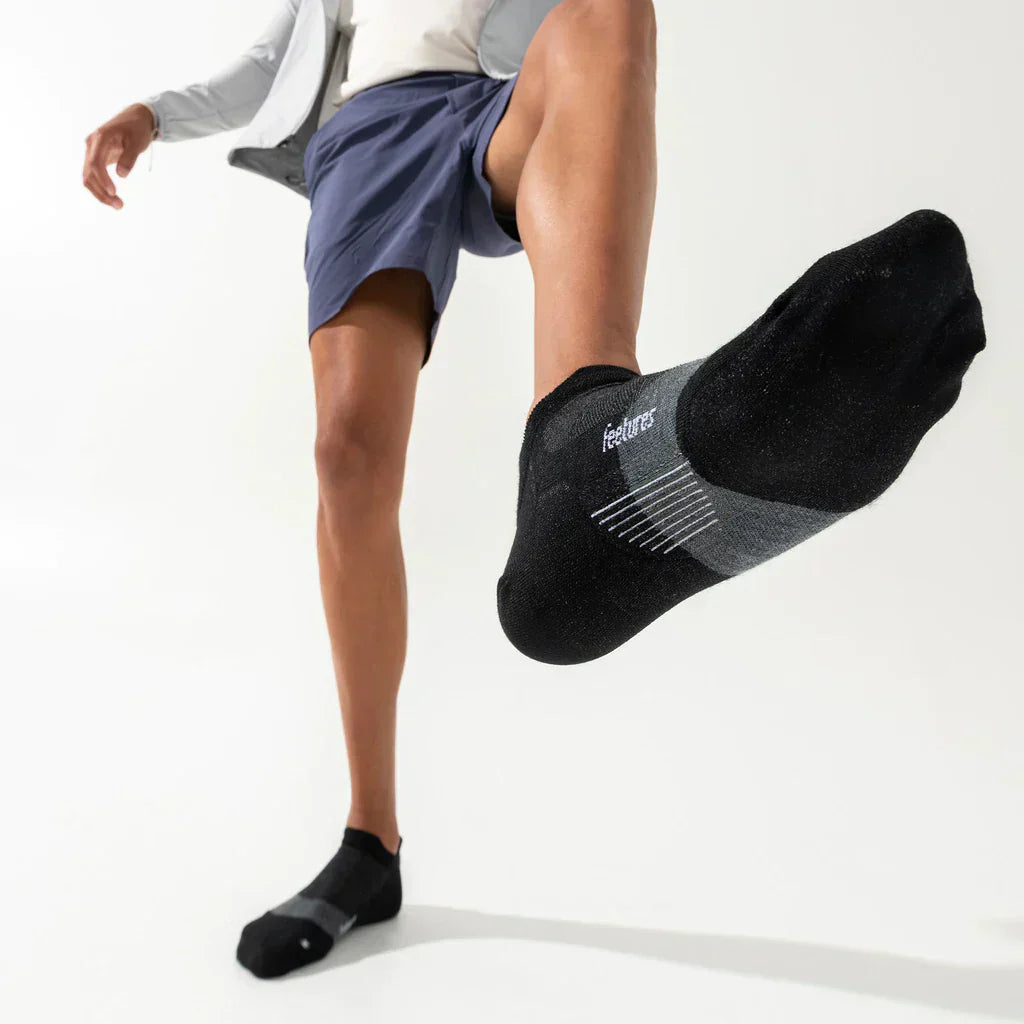 Feetures Merino 10 Ultra Light Tab sock in Charcoal — heel detail #Color_Charcoal