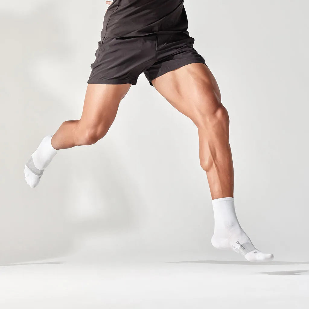 Feetures Elite Ultra Light Cushion Mini Crew sock in White — alternate view #Colour_White